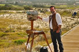 This is a picture of Stefan Baumann painting with his prochade box on location at Asliomar, CA.