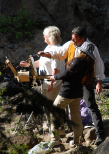This photo of Stefan Baumann helping a Workshop participant with her painting on location at the Middle Falls.