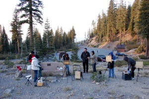 This is a photo of participants who are setting up to paint Mount Shasta en plein air at an Autumn Workshop with Stefan Baumann.