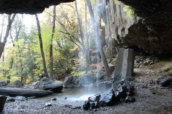 This is a photo of a view of Hedgecreek Falls taken from the space behind the Falls which is an unusual viewpoint for participants who enjoy painting to paint.