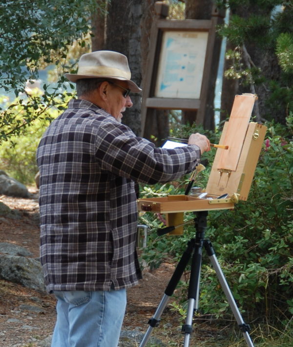 This is a photo of Rich painting a view of Castle Lake at Stefan Baumann's Basics Workshop in 2015.