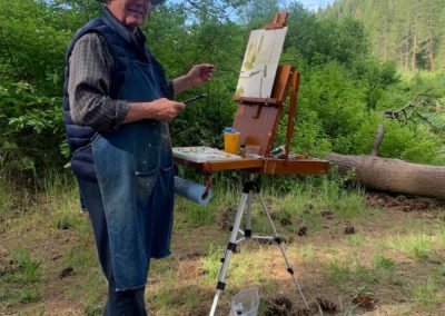 Workshop participant paints at The Grand View Ranch